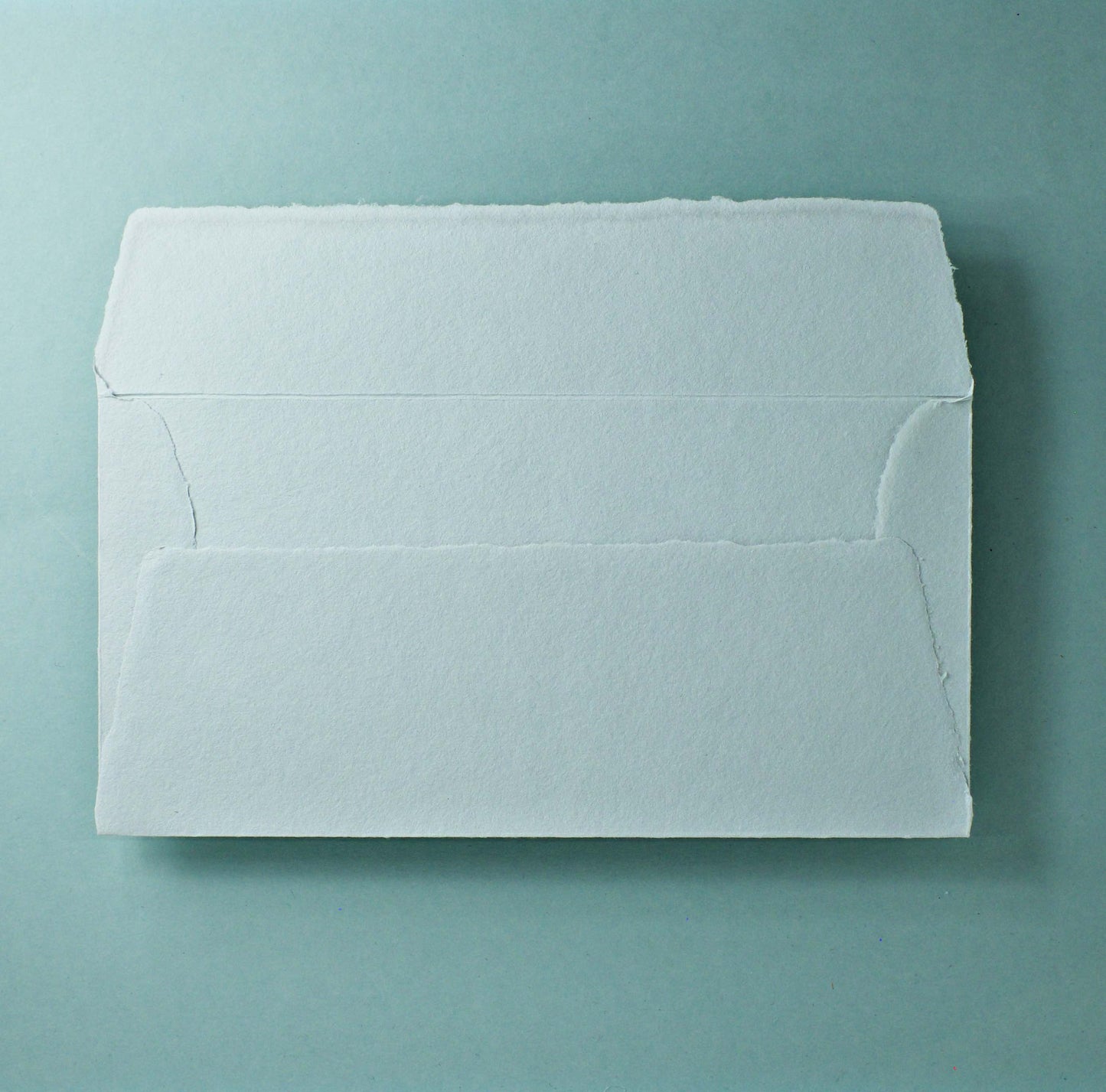 Büttenpapier-Umschlag DIN-lang - Trapezlasche - lichtgrau