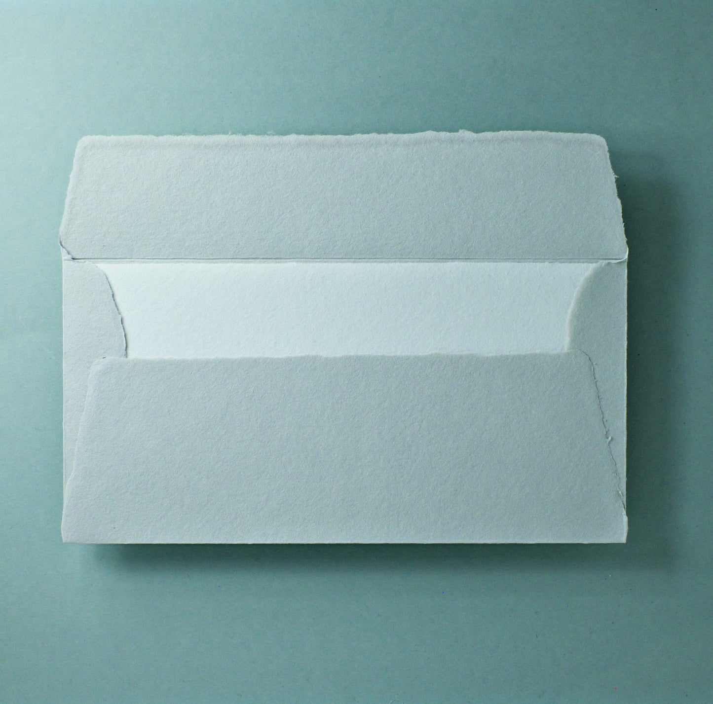 Büttenpapier-Umschlag DIN-lang - Trapezlasche - lichtgrau